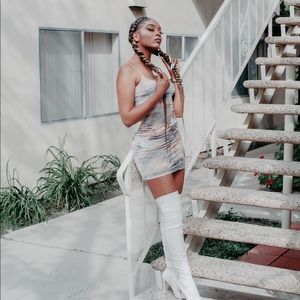 White knee high boots